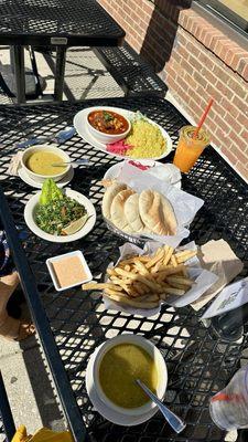 Lentil soup, moroccan stew with saffron rice, fries, & fresh mango juice