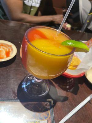 Peach, mango and strawberry frozen margarita