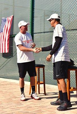 USPTA district 4 Pro of the Year, Oliver Messerli receiving his award.