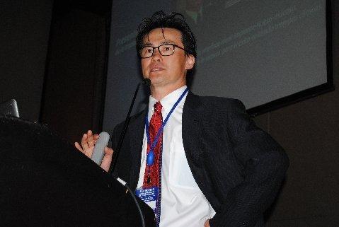 Dr Jin Kim speaking in Bogota, Colombia, 2011