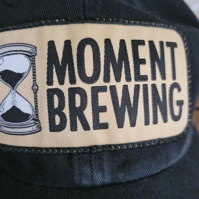 Had to get swag! Moment Brewing's logo on the black cap I purchased here!