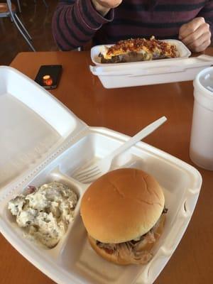 Pulled pork sandwich and loaded baked potato