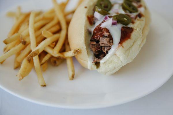 BBQ Philly - Chopped brisket, our white cheddar cheese, our homemade original sauce with onions and jalapenos.