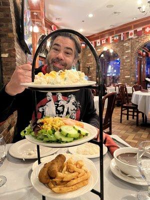 Tower of salad bar sides. Liked this better than going up to a buffet