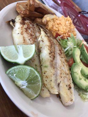 Tilapia with French fries, salad, and Mexican rice