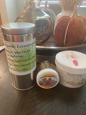 Organic lemongrass tea, organic honey, and organic moisturizer all made by Lyn Ross the owner.