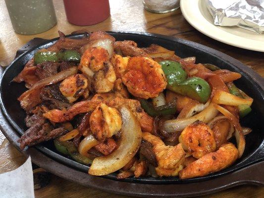 chicken, steak, and shrimp fajita.