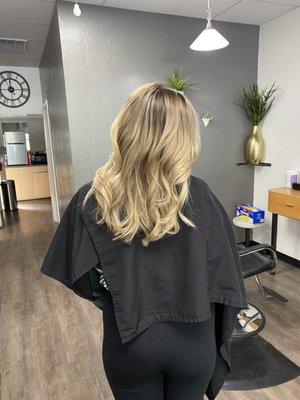 Blonde highlights all through hair w/ dimension