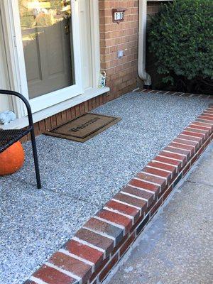 Exposed Aggregate Front Porch with Brick Face and Border