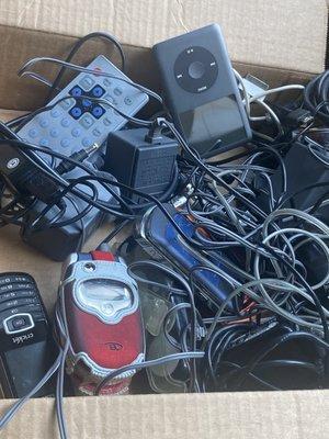 Cords and old phones and electronics. They only take 3/per visit ugh