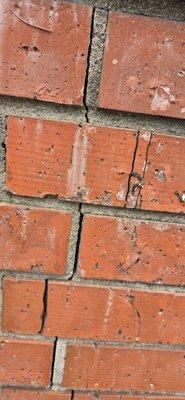 cracked bricks in need of repair