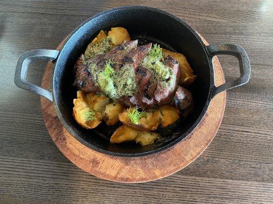 Steak with smashed potatoes.  Herb butter was fantastic.