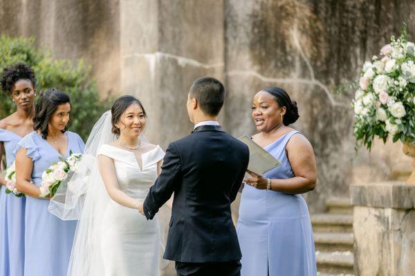 All ceremony florals (bouquets, boutonnieres, altar arrangements, aisle adornments, etc.) by UFE. Photo by Leigh Wolfe Photography.