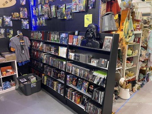 Vintage video games and funko pops. Vintage Star Wars action figures.