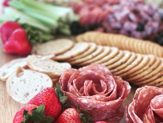 Salami roses on a grazing board