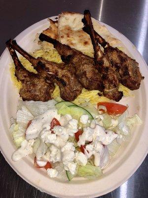 Lamb chops over rice