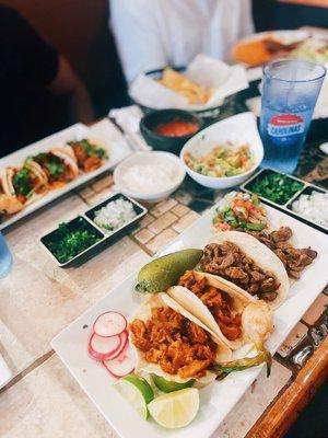 2 carne asada and 2 pastor tacos