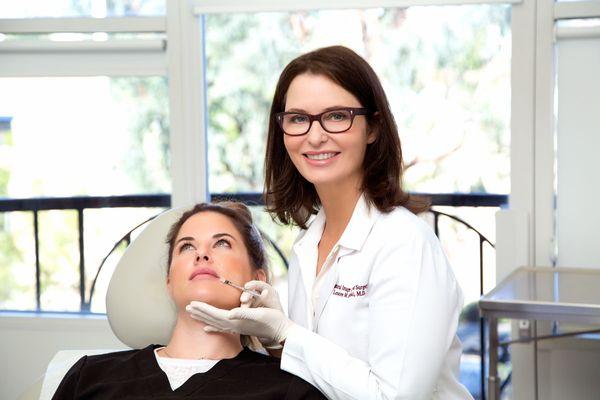 Dr. Sikorski performing a lip injection.