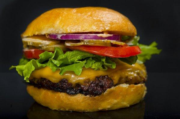 tasty cheeseburgers add some fresh cut fries and a drink you got a meal