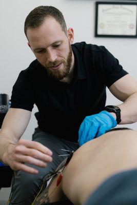 Dr. Gavin using Dry Needling technique on a patient