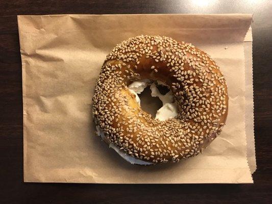 Sesame bagel toasted with plain cream cheese