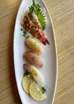 Toro, tiger shrimp, scallop and red snapper.