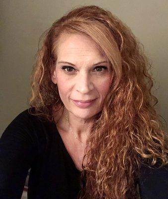 Your stylist, JERILYNN!   Naturally curly hair is always welcome here!