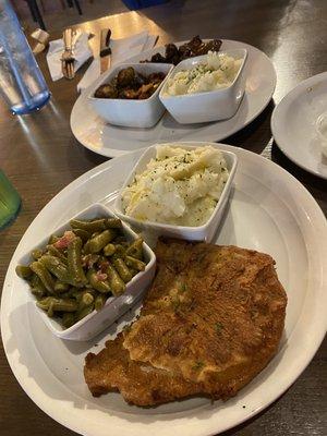 Pork Chop, garlic mashed potatoes, and green beans.