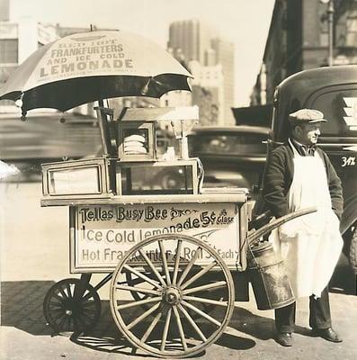 Hotdog/lemonade vendor on the corner of Moore and West Streets, the Lower West Side then but Tribeca today.