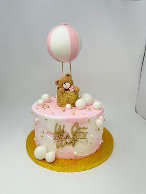 Customized baby shower cake.