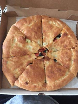 Stuffed pizza. More like giant calzone.