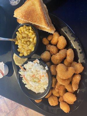 Popcorn Shrimp with coleslaw, corn, and toast.  Someone try the hush puppies.