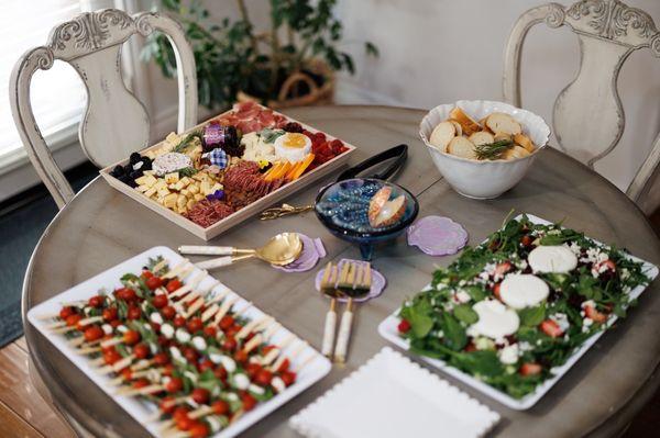 Caprese skewers, burrata salad, cheeses board