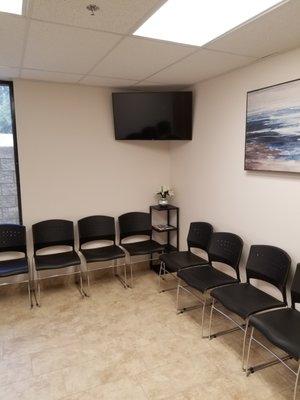 Clean and spacious patient waiting area.