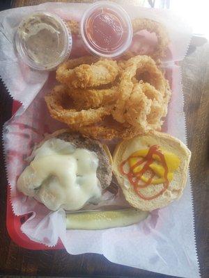 Pete's burger with hand breaded onion rings.  Good dipping sauce for the rings.