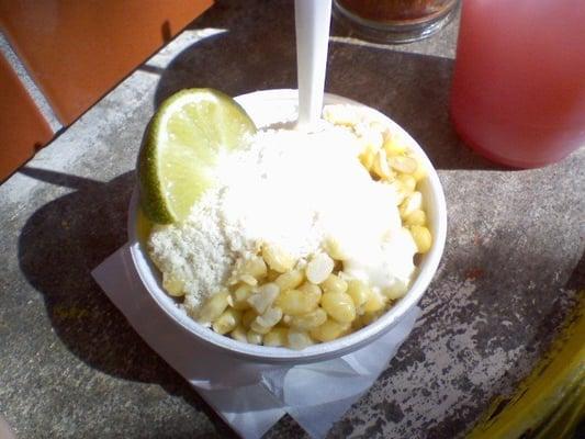 Elote, from the big corn pot they cook on Sat/Sun, Comes with Lime/ Cheese / Mayo, with a Chili&Salt option