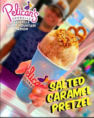 A local Favorite! Salted Caramel Pretzel Flavored Snoball with Pretzels and caramel drizzle!