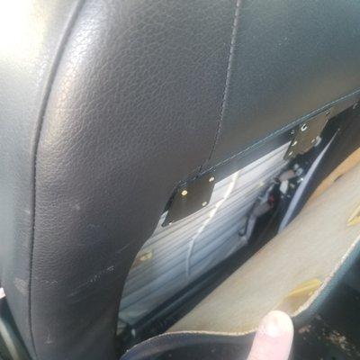 An airbag is usually fastened where this hole is.