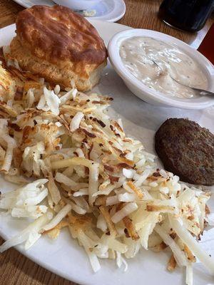 Biscuit & gravy with a side of sausage and hashbrowns