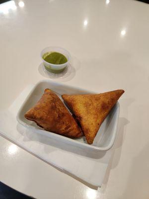 Vegan samosas and green chutney