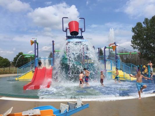 Awesome bucket fills up with water and splashes on everybody