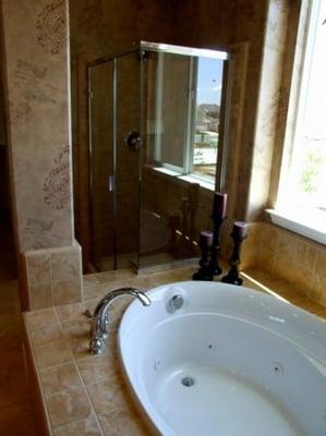 Master suite shower and jacuzzi combo.