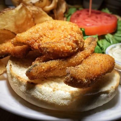 Fresh, Hand-Breaded Lake Erie Perch, Lettuce, Tomato and Tartar Sauce.