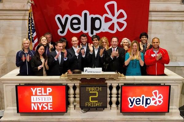 Yelp CEO Jeremy Stoppelman and team at the March 2012 Yelp IPO on the New York Stock Exchange