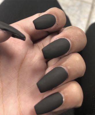 Black matte nails. They did great. The angle makes them look off but I assure you the shape and color were perfect.