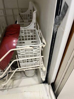 Rusted out dishwasher.