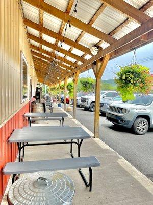 Picnic Tables in front of entrance.