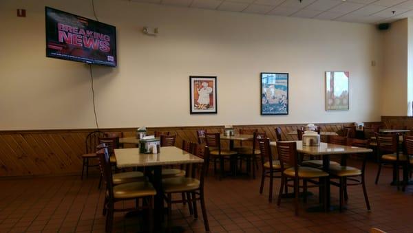 Nice clean seating area with big screen TVs!