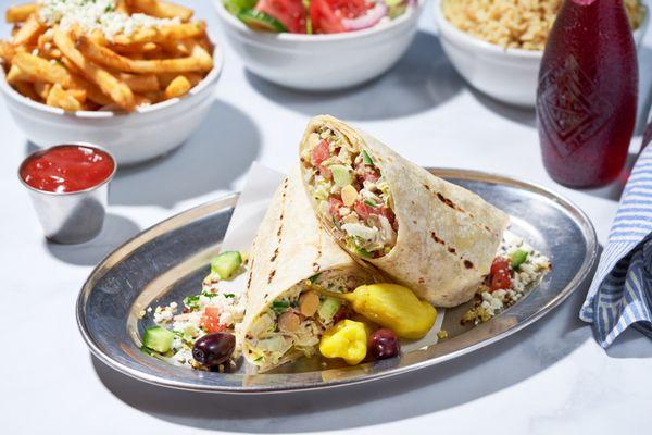 Aegean Greek Salad Wrap
 (Add Chicken or Falafel or Avocado) Lettuce, Tomato, Red Onion, Cucumber, Olives, Quinoa, Feta, Hummus in Tortilla