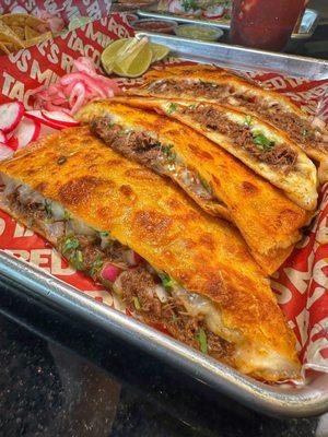 Red Quesadilla- Birria, jack cheese, cilantro & onions